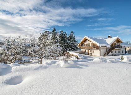 Ferienwohnungen Ursprungshaus des Edlgütls: Außenansicht im Winter